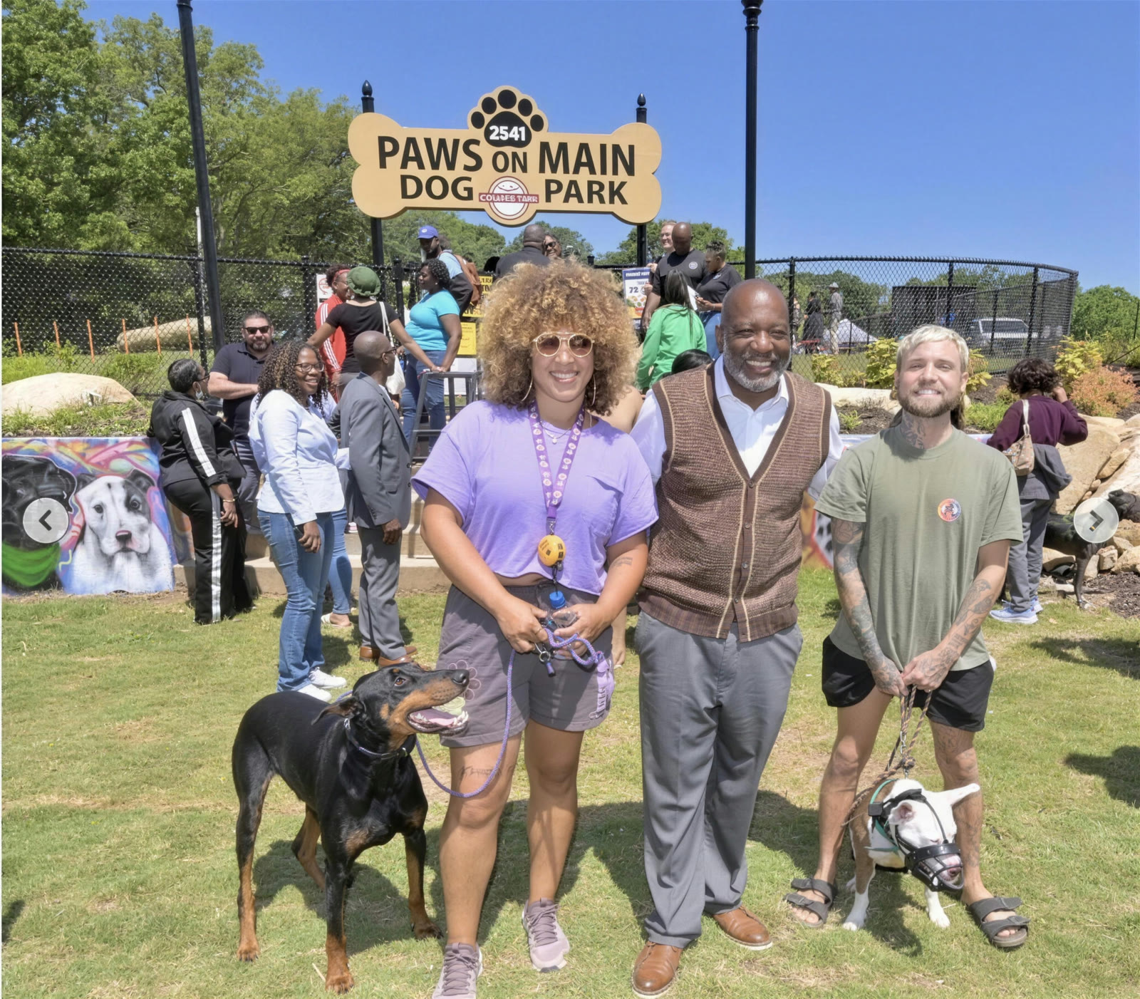 College Park residents and their dogs at the Paws on Main Dog Park opening